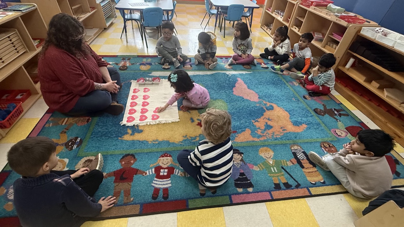 Teacher guiding children during Montessori circle time in San Jose classroom
